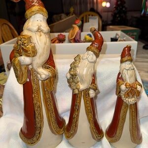 Set of Three Santa Figurines with Red and Gold Accents